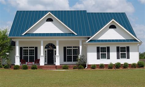 blue house with green metal roof|blue corrugated roofing.